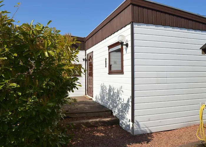 Villa met zwembad: Vakantie Chalet Makkum