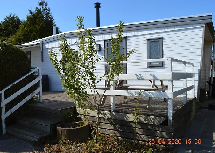 Villa met zwembad: Vakantie Chalet Makkum